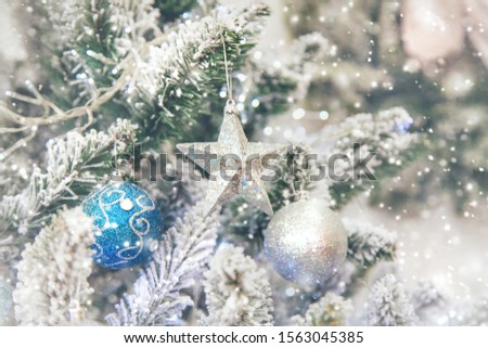 Christmas tree with decorations and gifts. Selective focus. Holiday.