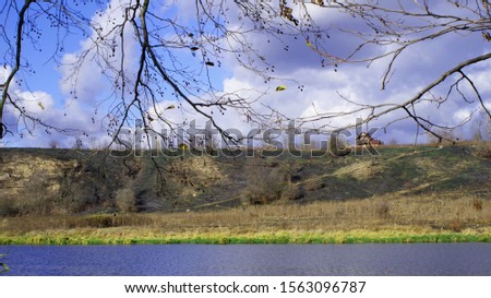 autumn landscape, sunny autumn day by the river