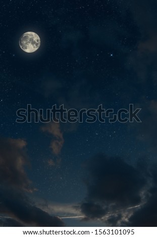 night sky with big moon and clouds