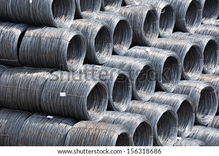 Stacked steel wire roll ready for shipment in port Royalty-Free Stock Photo #156318686