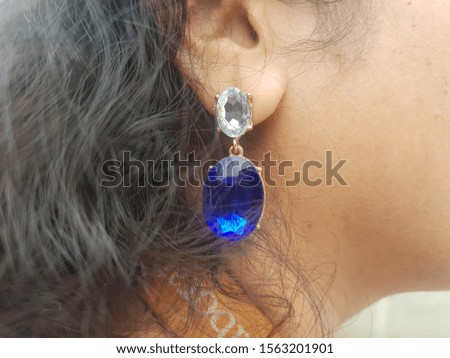 Pair of gpld  metal  blue stone earring