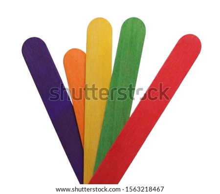 Colorful wooden spatulas, plywood planks, boards isolated on white background with clipping path