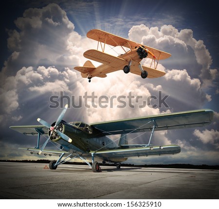 Retro style picture of the biplanes. 