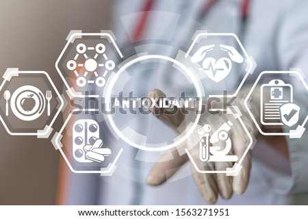 Natural Antioxidants Nutrition Diet Treatment Medical Innovative Concept. Royalty-Free Stock Photo #1563271951