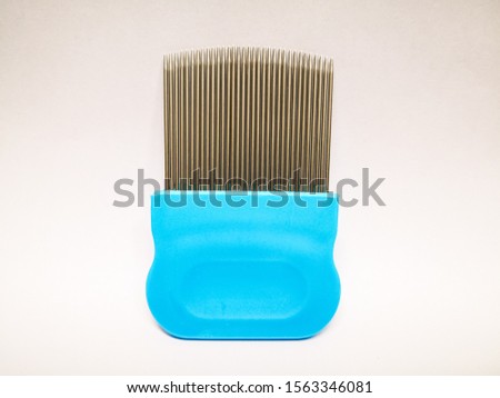 Stainless steel lice comb with plastic handle 