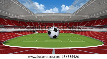 Sports background - soccer ball on green stadium 