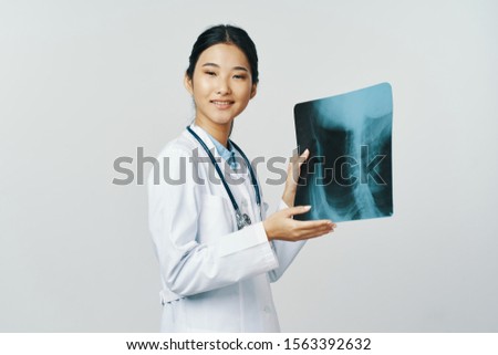 woman doctor x-ray medical coat stethoscope
