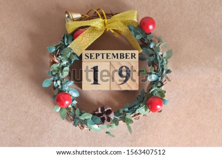 September Month, Christmas, Birthday with number cube design for background. Date 19.