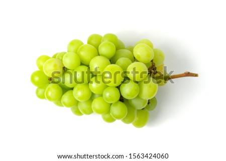 Fresh green grape isolated on white background top view. Royalty-Free Stock Photo #1563424060
