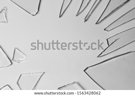 Broken glass pile pieces of texture and background isolated on white, cracked window effect. Emergency condition