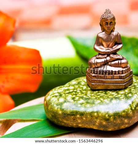 Buddha and wellness decoration with stone

