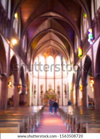 Blurred photo inside of beautiful church