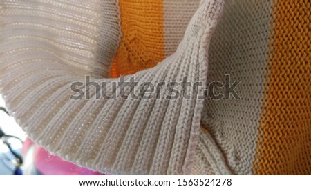 Abstract Yellow and white woolen background and texture. 