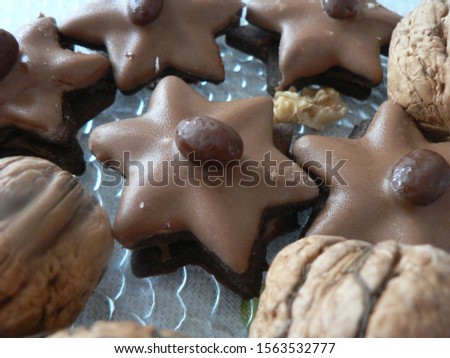 
Christmas cookies - brown chocolate-coffee stars from Linz dough