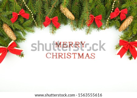 White Christmas blank with decorated fir branches, and the inscription Merry Christmas