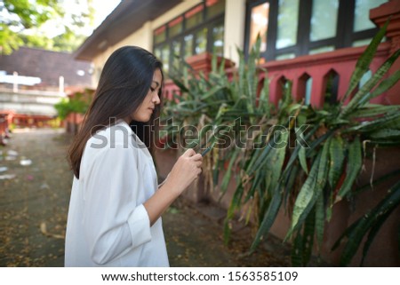 Woman using smartphone online shopping
