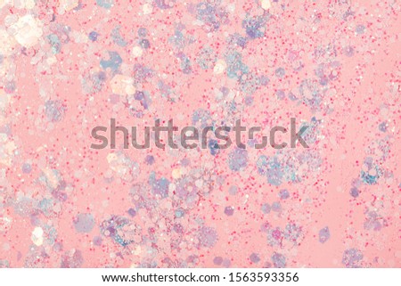 Falling confetti on bright background. Holiday and party concept.