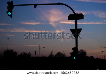 Traffic lights outdoors in early morning 