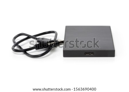 External hard drive disc with usb 3.0 cable. Best way of data storage on portable hdd. Close-up, isolated on white background, full depth of field.