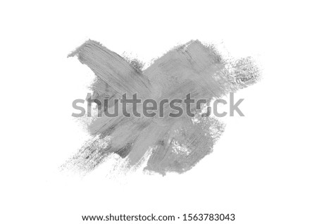 Smear and texture of lipstick or acrylic paint isolated on white background. Stroke of lipgloss or liquid nail polish swatch smudge sample. Element for beauty cosmetic design. Gray color