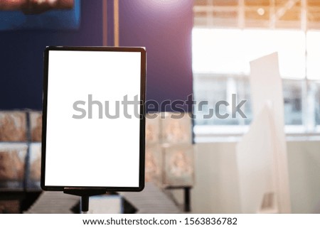 Mock up white black Label for blank menu frame in restaurant and books store for Stand booklet sheets paper tent card on table cafeteria display your product blurred background insert  text