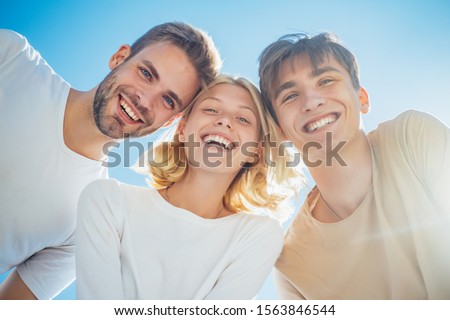 Happy group young people. Cheerful smiling happy best friends walking outdoor together and having great time. Sweet memories about summer holidays. Leisure activity and friendship concept Royalty-Free Stock Photo #1563846544