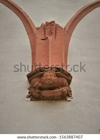 Isolated Medieval Sandstone Carving on Wall
