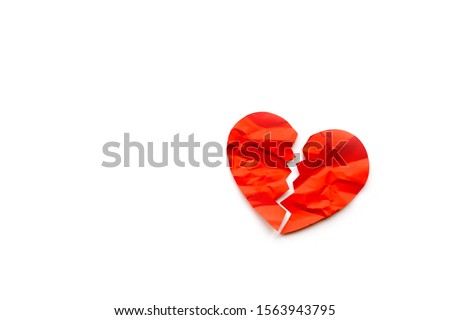 Red paper broken heart on white background Royalty-Free Stock Photo #1563943795