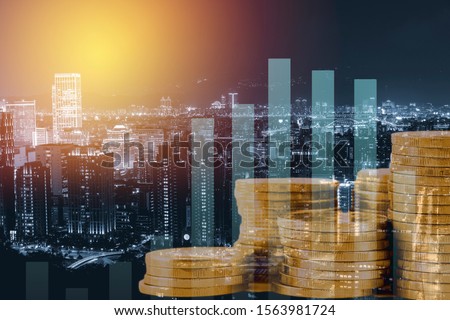 Double exposure business trading investment graph on city and money Royalty-Free Stock Photo #1563981724