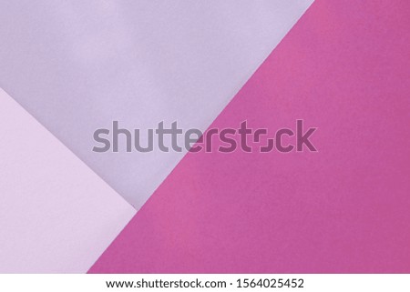Lilac purple paper background. Geometric figures, shapes. Abstract geometric flat composition. Empty space on monochrome cardboard.