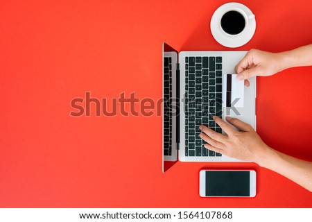 Top view of male hands making online payment. Holiday shopping. Royalty-Free Stock Photo #1564107868