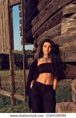 Photoshoot with a brunette in an old village