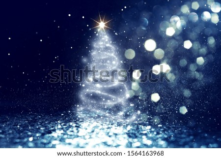 background of Christmas tree with defocused glitter lights