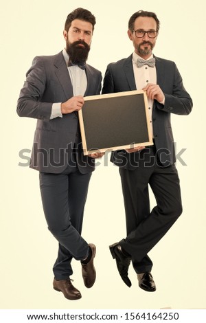 businessmen in suit, copy space. partners celebrate start up business isolated on white. announcement. party invitation. bearded men hold advertisement blackboard. welcome on board. advertisement