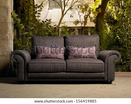 Sofa in a beautiful patio of an old convent in Spain