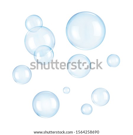 Soap bubbles on a white background Royalty-Free Stock Photo #1564258690
