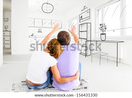 couple at their new empty apartment Royalty-Free Stock Photo #156431330