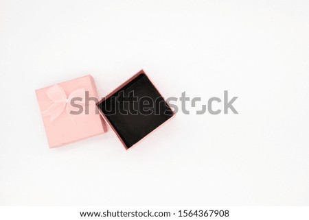 Pink open gift box isolated on white background