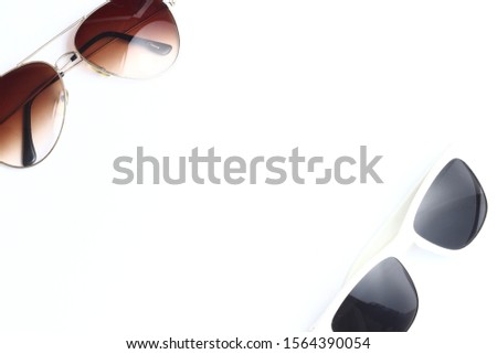 Isolated picture of sunglasses. white background. Reduction of Vision Damage. UV Protection. sunglasses provide protection against the sun and its harmful elements