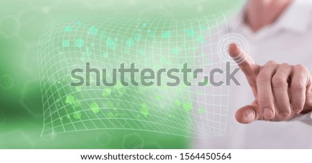 Man touching an abstract network concept on a touch screen with his finger