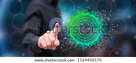 Man touching a technology concept on a touch screen with his finger