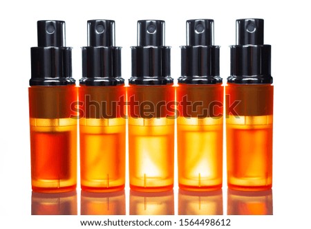 few perfume bottles on a white background