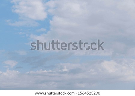 Natural light from the sun with blue sky and white clouds.