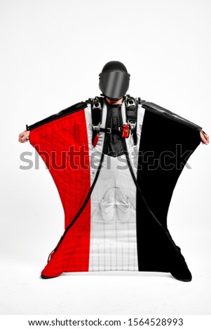 Yemen flag travel. Bird Men in wing suit flag. Sky diving men in parashute. Patriotism, men and flag.
                               