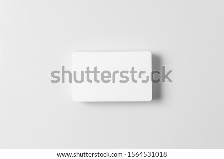 Stack of  white blank credit cards mockup on white background.