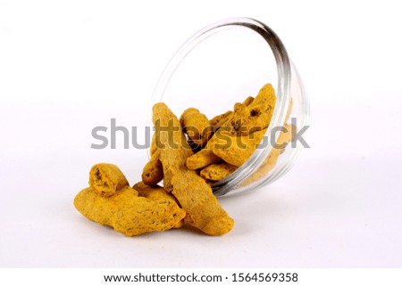Turmeric on bowl Isolated in white