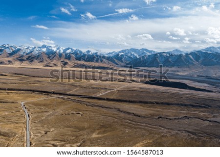 aerial view of the curved Qilian mountain road