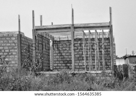 Construction in Africa. Unfinished building. Construction industry. Black and White Photography 
