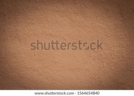 Soil wall texture of clay house structure, wall home made from mud with vintage tone picture. Soft picture