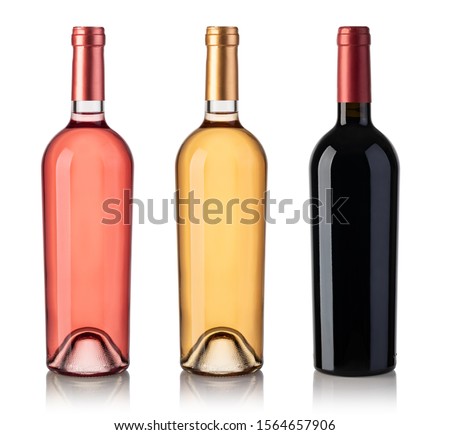 Set Of White, Rose, And Red Wine Bottles. Isolated On White Background Royalty-Free Stock Photo #1564657906